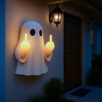 Halloween ghost with a glowing night light on its middle finger