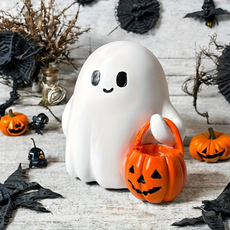 Halloween ghost with a glowing night light on its middle finger