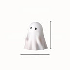 Halloween ghost with a glowing night light on its middle finger