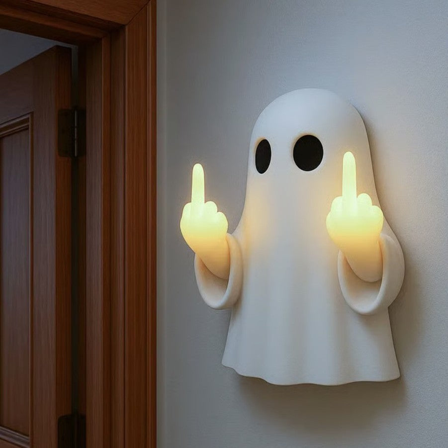 Halloween ghost with a glowing night light on its middle finger